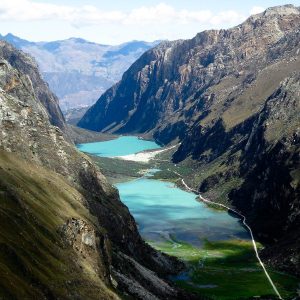 Trekking Santa Cruz Llanganuco landscape with turquoise lake in Cordillera Blanca, Peru